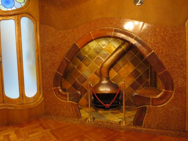 A small room with fireplace designed for a couple on one side and their chaperon on the other...