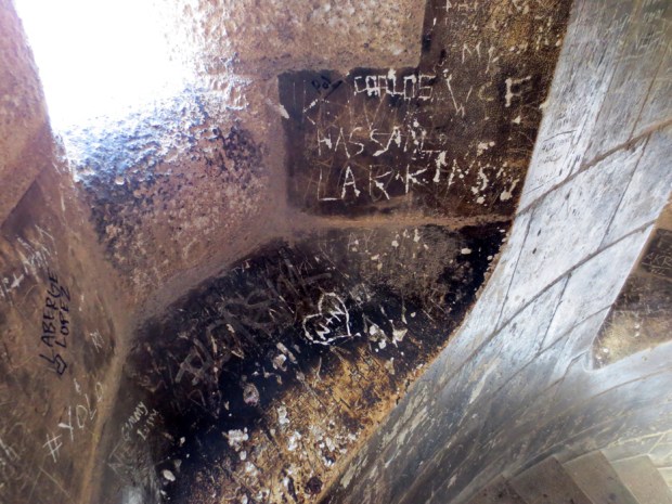 Ugly graffiti and chewing gum... Way to go, you little a**holes...