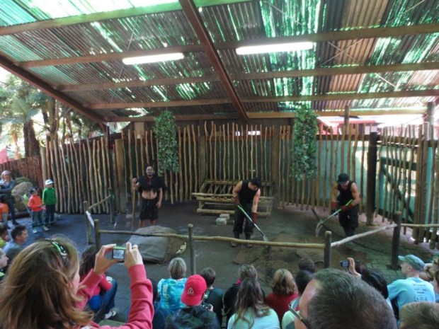 The guys removing the food from the pit