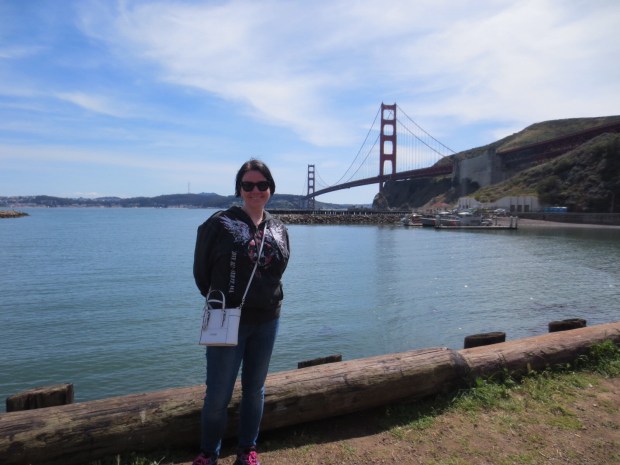 What happens when you get the guide to take a picture of you with the Golden Gate