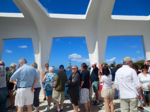 You can see the Arizona, sunken, on each side of the memorial main room