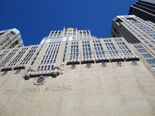 This is the opera house, the one that resembles a huge chair. Above the windows straight up there is the "seat"